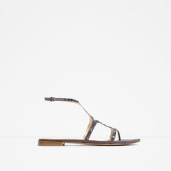 FLAT SANDALS WITH SHINY DETAILS