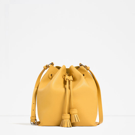 TASSELLED BUCKET BAG